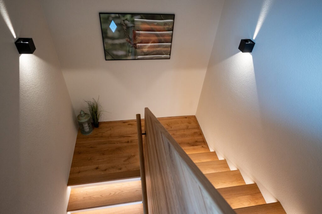 Ferienwohnung Murmale - Treppenhaus mit Oachkätzle Bild